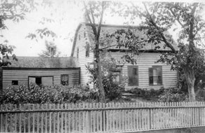 old house with a picket fence