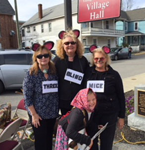 women dressed as mice