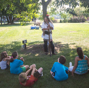 Indian talk to group of children