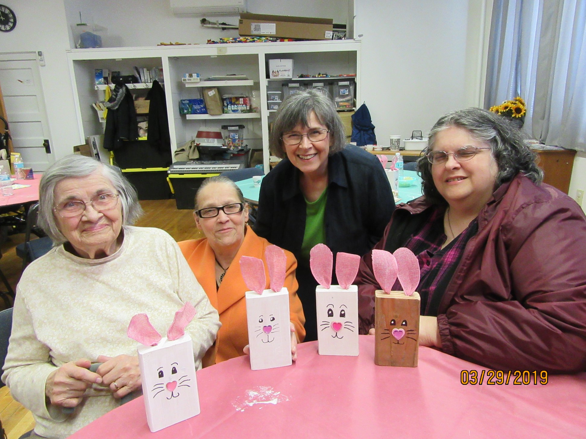 table of women with easter cards