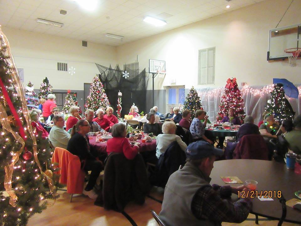 senior citizen gather for a holiday party