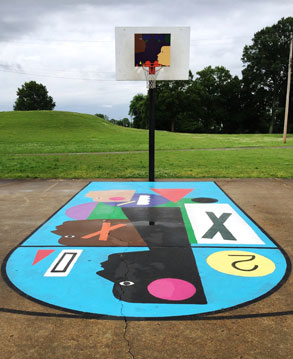 multicolored basketball court with hoop