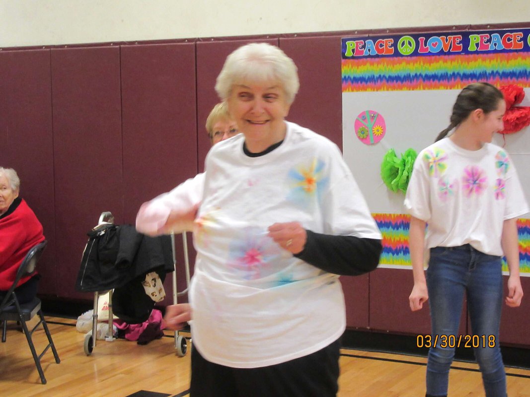 woman in ty dye shirt