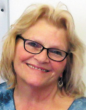 women with glasses smiling