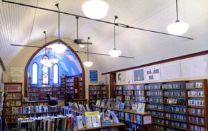 inside public library with many book shelves