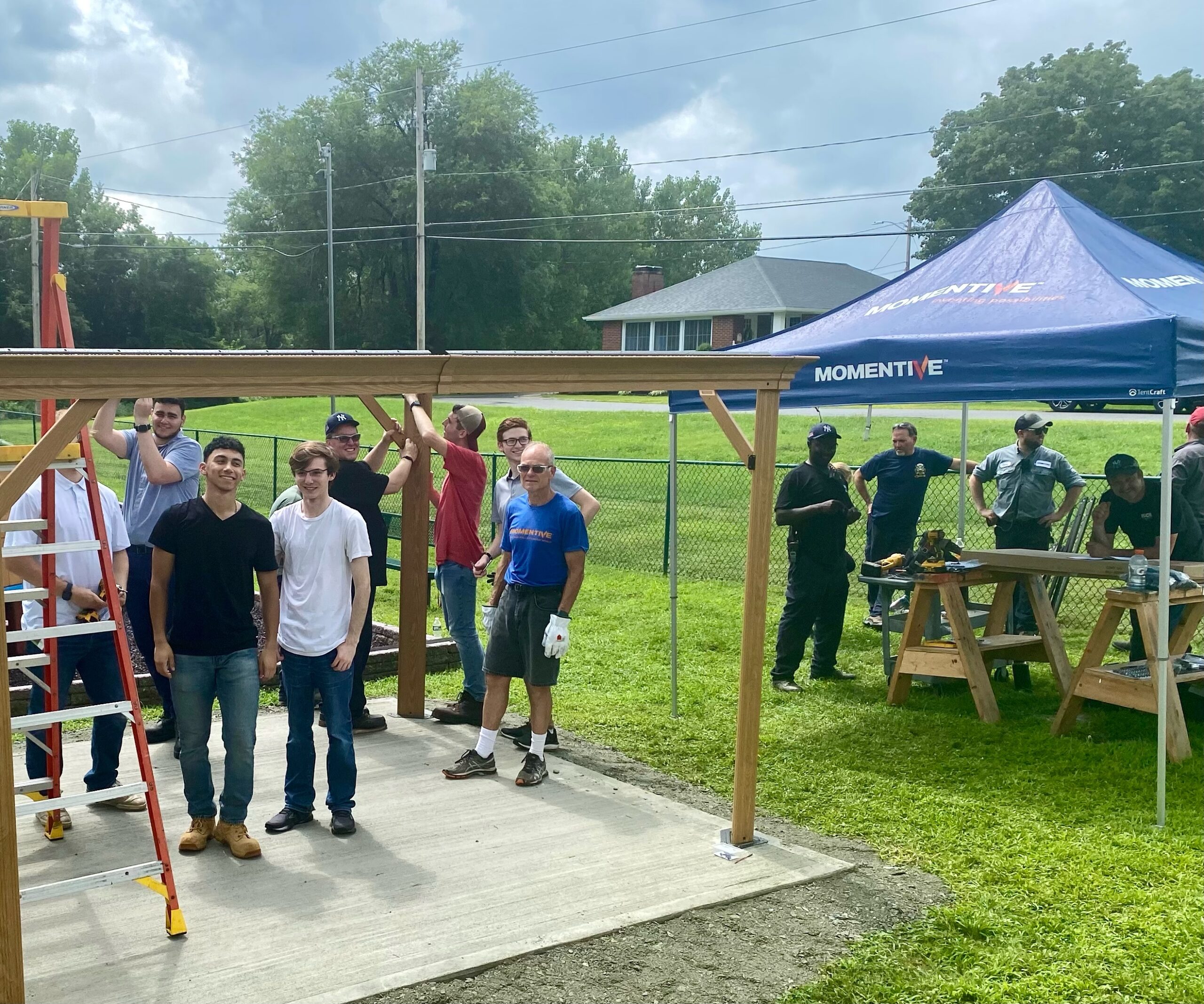volunteers build a park pavilion