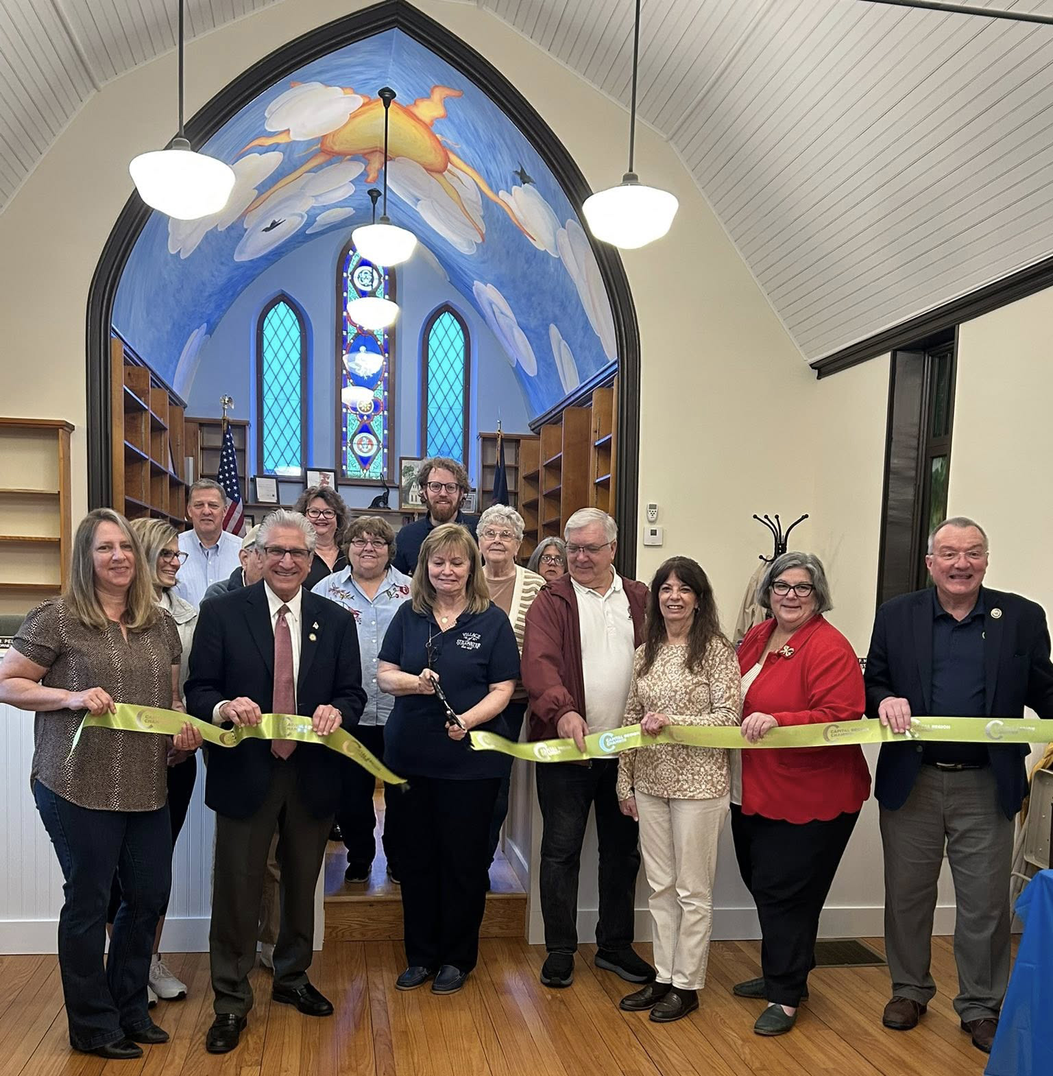 group of official cut ribbon opening new office